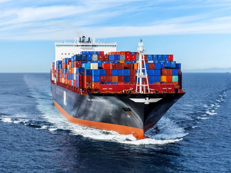 merchant ship transporting goods on the high seas